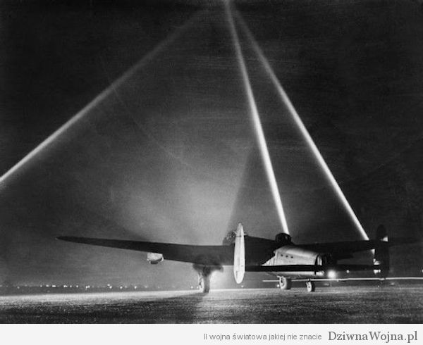 An-Avro-Lancaster-on-the-runway-before-taking-off-for-an-air-raid-with-searchlights-indicating-the-height-of-the-cloud-base-1943
